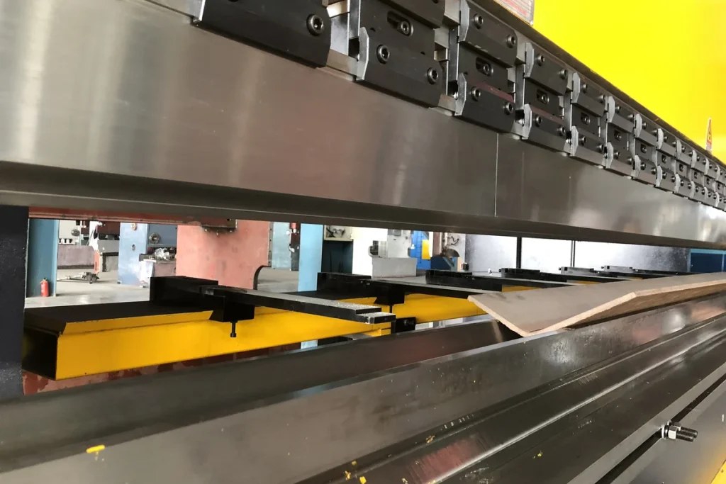 CNC press brake bending sheet metal into precise custom angles
