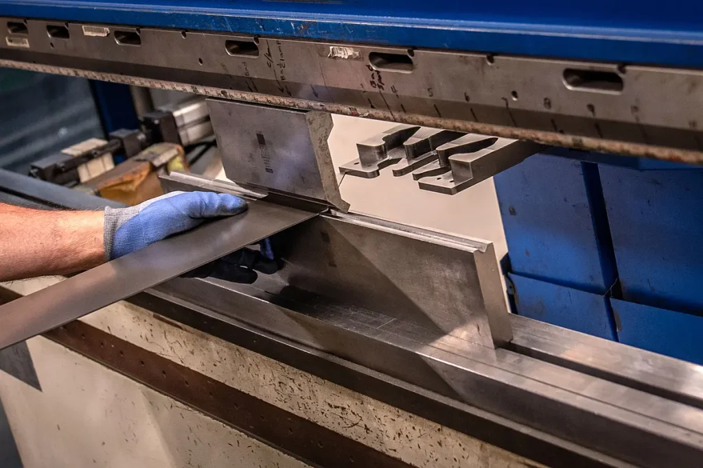 Sheet metal punching and stamping process for repeatable high-volume components